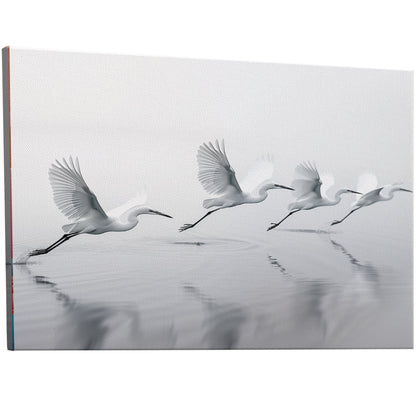 Tranquil wall art depicting elegant egrets flying over serene lake - Serene Flight