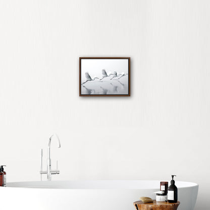 Tranquil wall art depicting elegant egrets flying over serene lake - Serene Flight